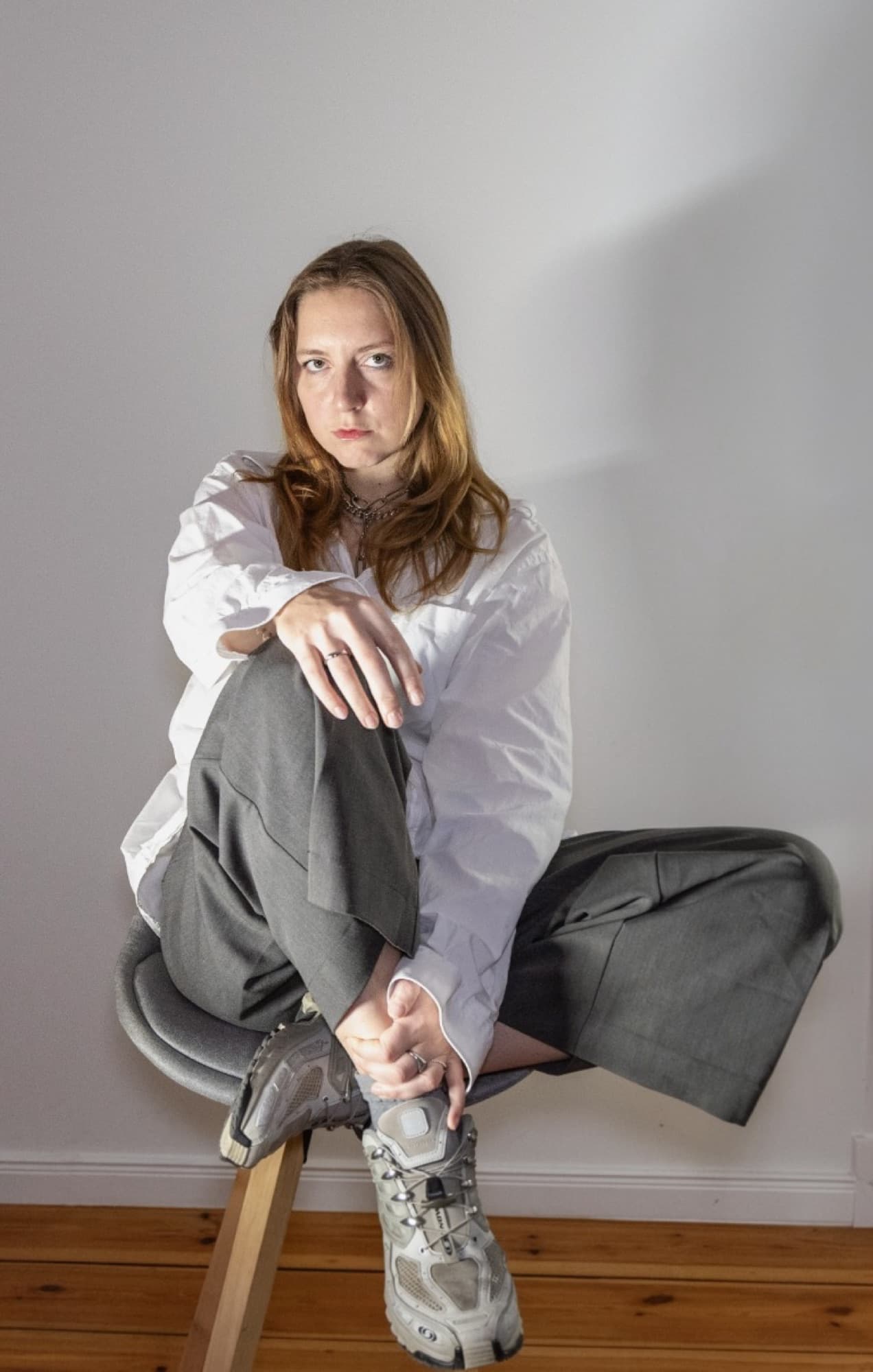 Julez seated on a stool